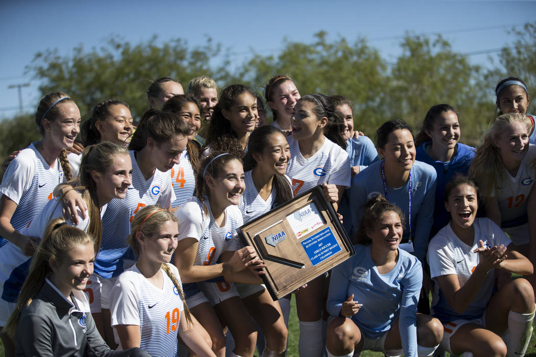 Bishop Gorman players celebrate their victory against Arbor View in the Sunset Region girl&# ...