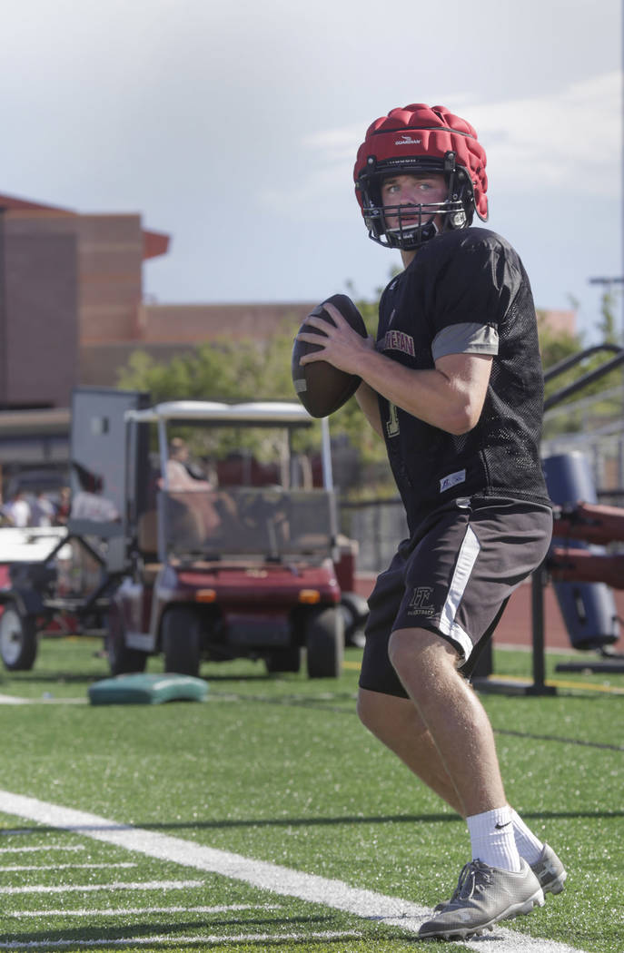 Faith Lutheran quarterback Sagan Gronauer (7)warms up during practice at Faith Lutheran High ...