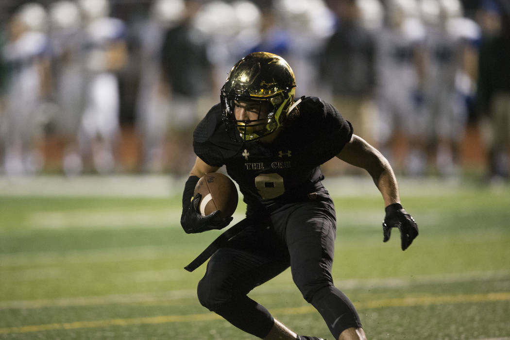 Faith Lutheran’s Keagan Touchstone (9) intercepts the ball against Green Valley in the ...