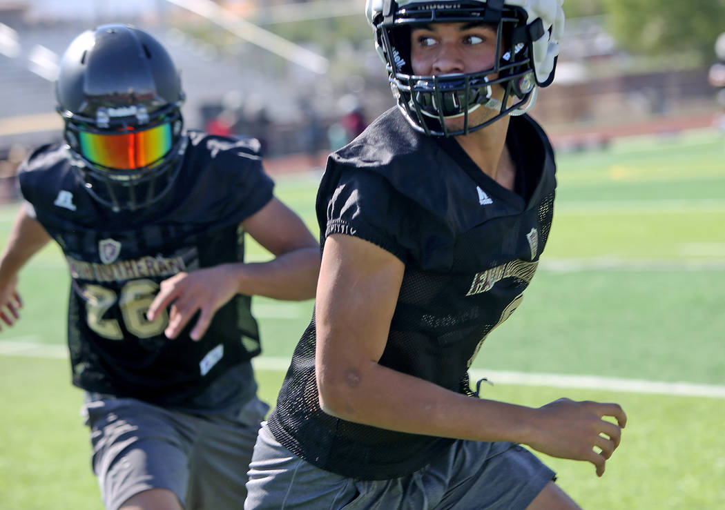 Greg Oliver (8) during a drill at Faith Lutheran football team practice at Faith Lutheran Hi ...