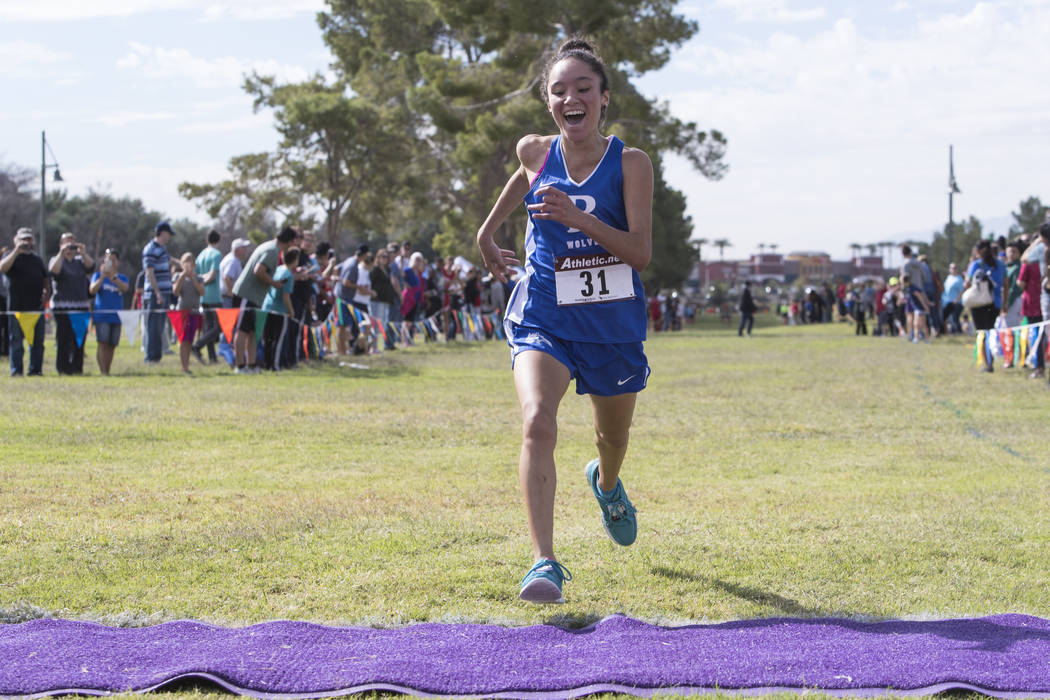 Raquel Chavez, from Basic High School, finishes first during the Regional 4A Sunrise Girls c ...