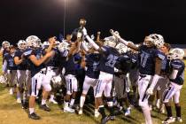 Centennial football players celebrate a 36-0 home victory over Legacy on Thursday night. Sam ...