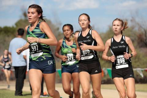 Green Valley’s cross country runner Mia Smith (597) leads a small group of runners in ...
