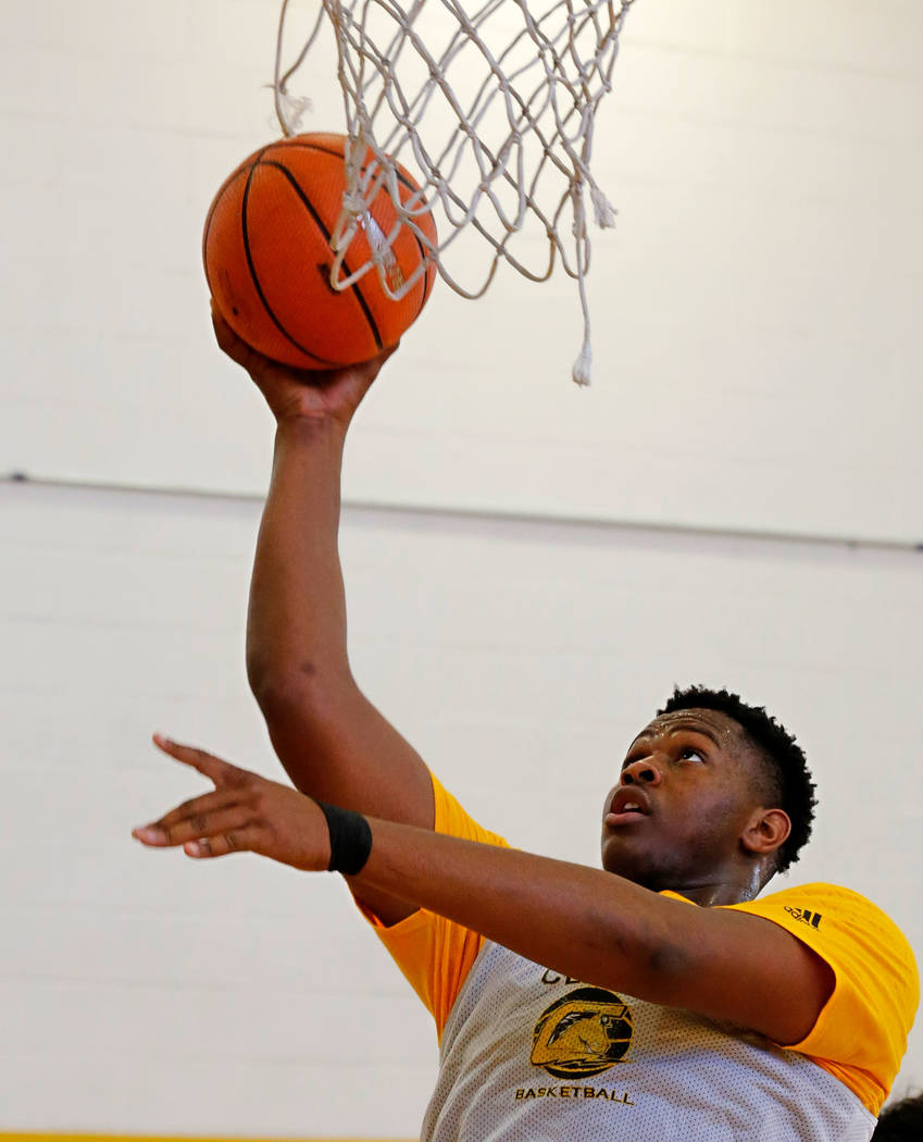 Clark forward-center Antwon Jackson shoots during a practice at Clark High School in Las Veg ...