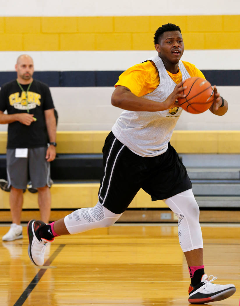 Clark forward-center Antwon Jackson looks to pass during a practice at Clark High School in ...