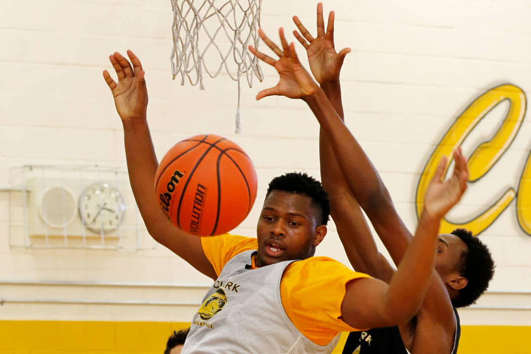 Clark forward-center Antwon Jackson, left, and his teammate Iverson Smith, during a practice ...