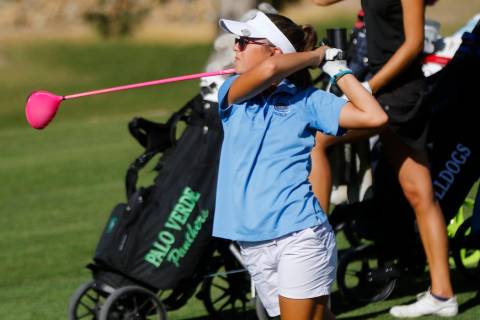 CentennialÕs McKenzi Hall watches her tee shot during the Class 4A state girls golf tou ...