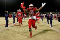 Liberty player Brandon Yates (50) celebrates after the class 4A Sunrise Region title game ag ...