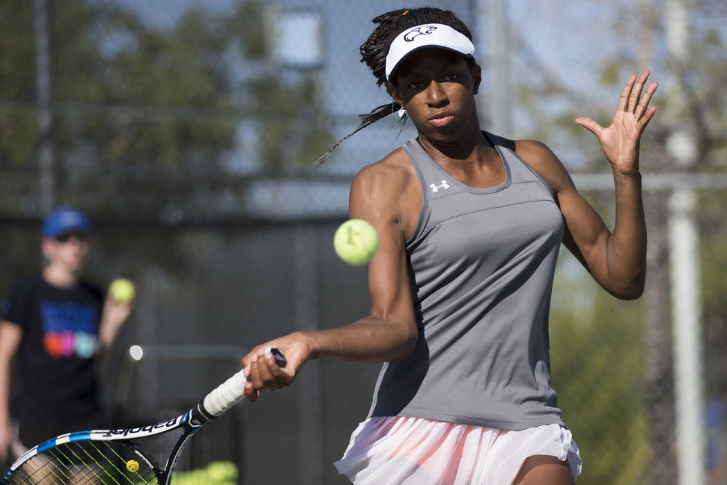 Kaya Richardson, 15, during a team tennis practice at Palo Verde High School in Las Vegas, W ...