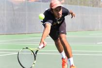 Clark High singles player Rahul Gupte returns the ball against Coronado High’s Ethan Q ...