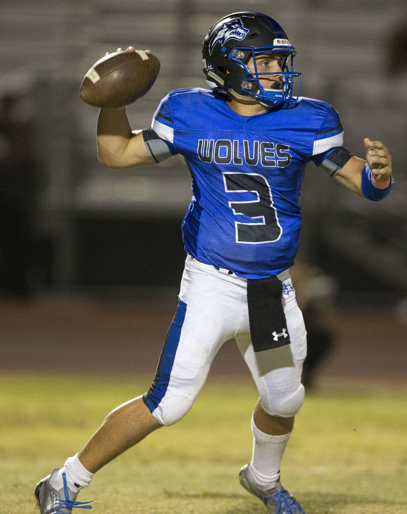 Basic quarterback Paul Myro IV (3) throws a pass against Foothill during the first half of a ...
