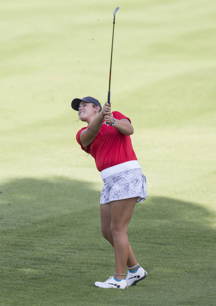 Arbor View’s Kyndall Newman hits an iron at Stallion Mountain Golf Club on Wednesday, ...