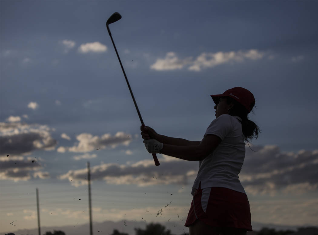 Coronado’s Victoria Estrada chips onto the green at Stallion Mountain Golf Club on Wed ...