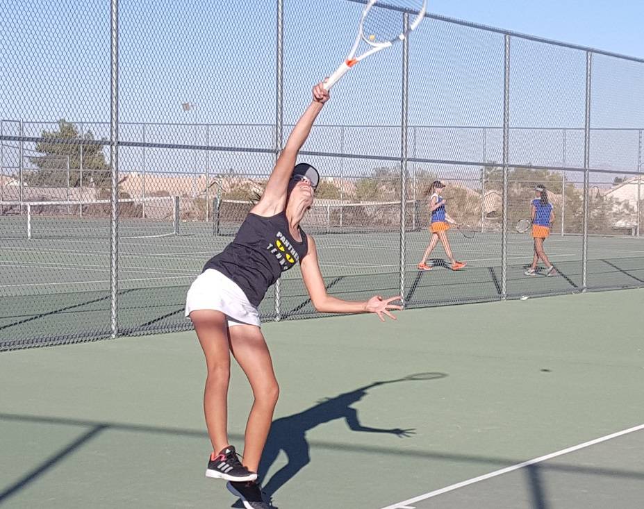 Palo Verde sophomore Lindsay Juhasz serves during her singles set against Bishop Gorman sen ...