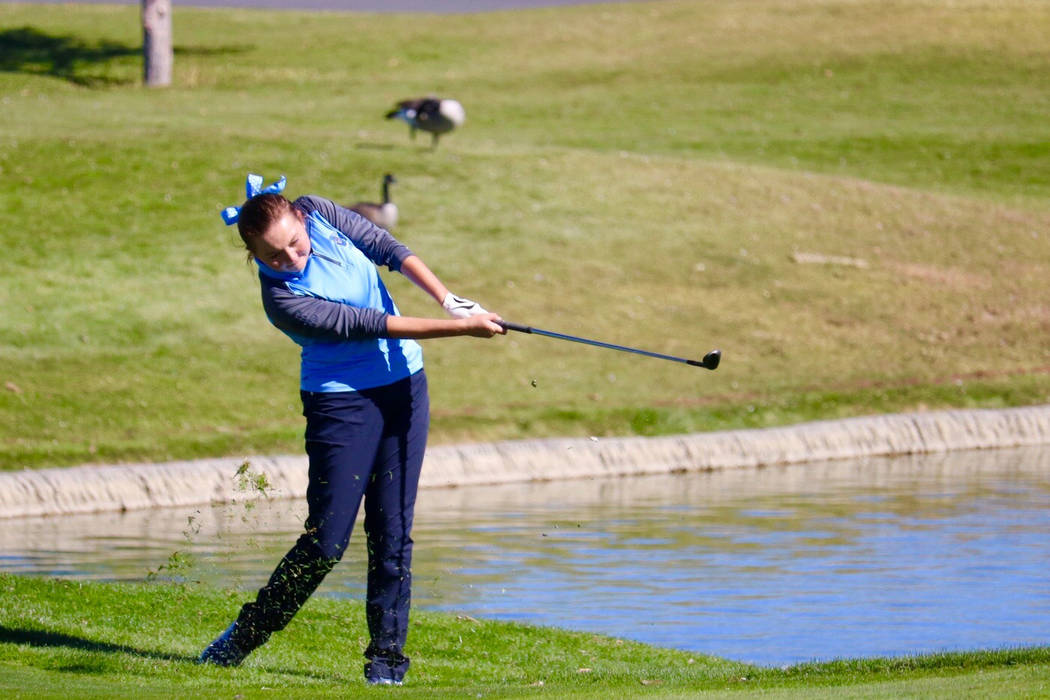 Centennial’s Hailey Stevenson takes a shot during the Class 4A state golf tournament a ...