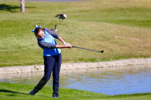 Centennial’s Hailey Stevenson takes a shot during the Class 4A state golf tournament a ...