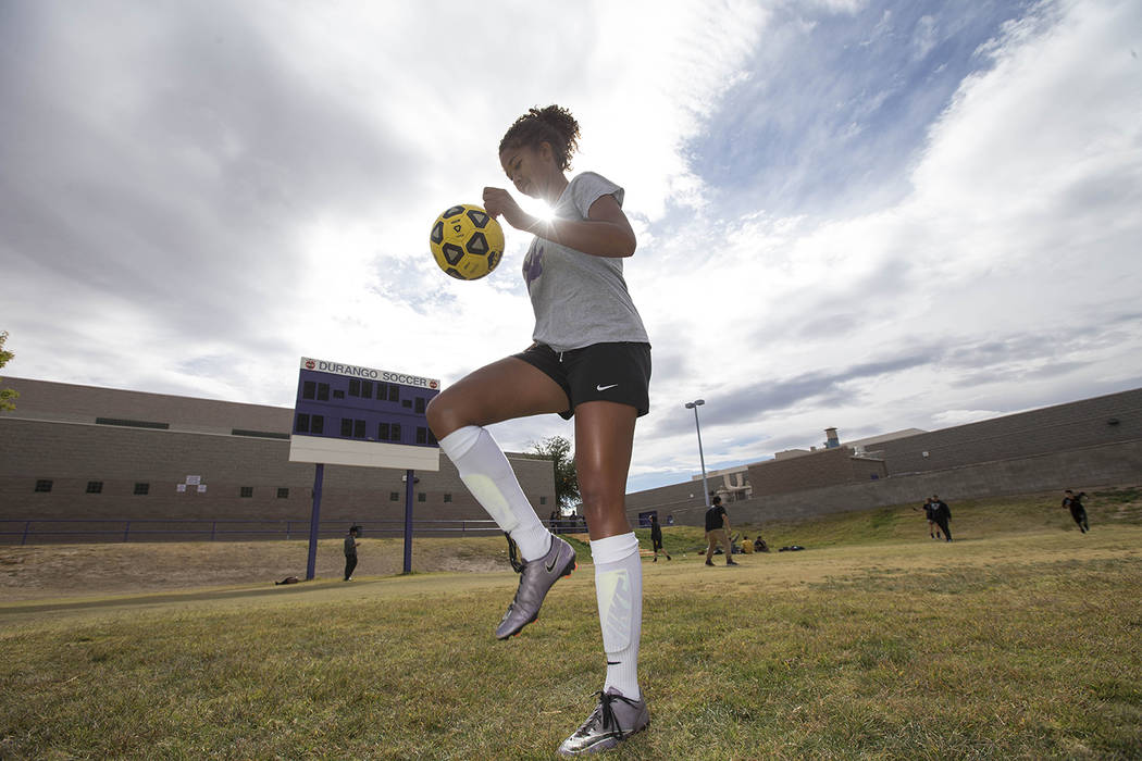 Durango senior soccer player Laila Loring dribbles the ball before practice at Durango High ...