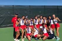 Coronado’s girls tennis team poses for a photo with the Class 4A state championship tr ...