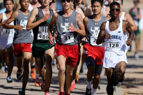 Runners during the 4A Mountain boys cross country region race at Veteran’s Memorial Pa ...