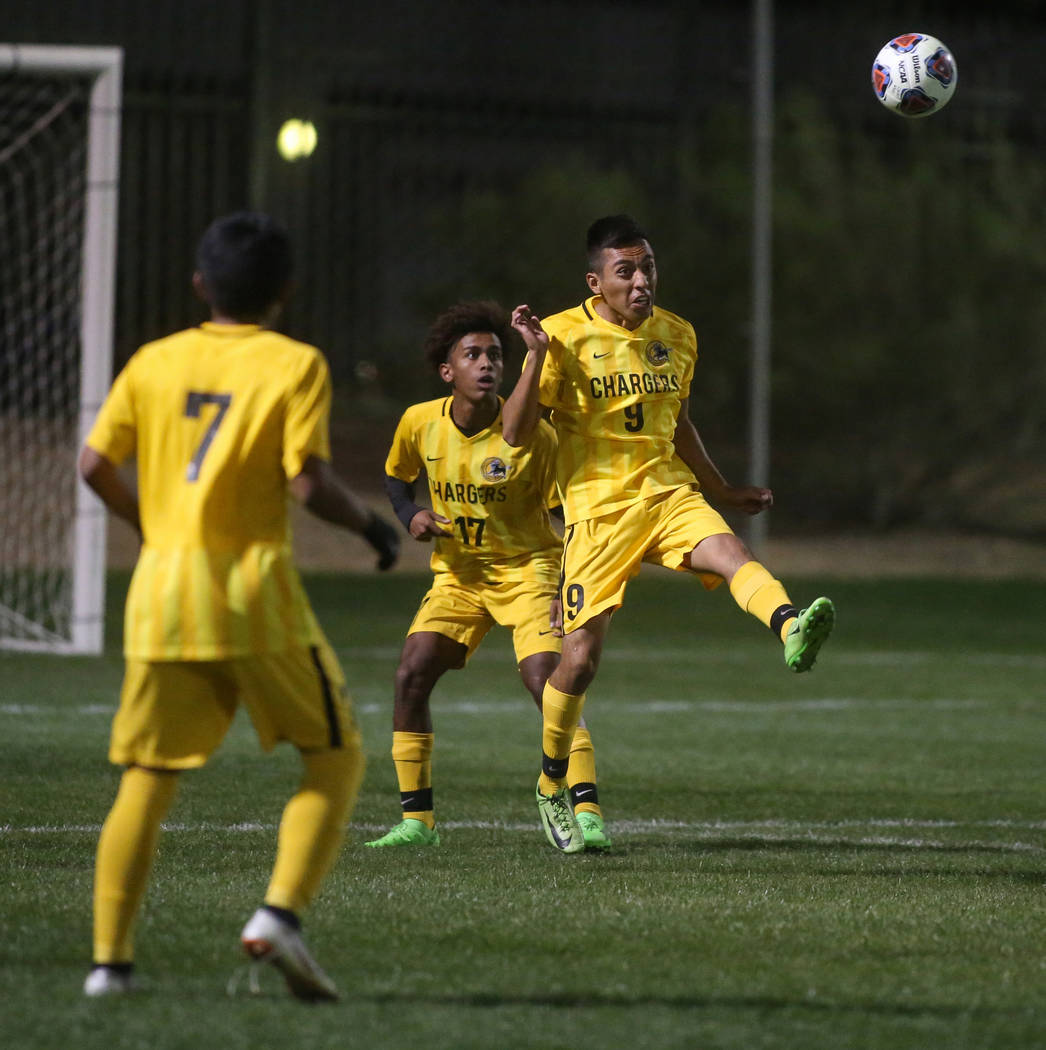 Clark High School’s Tomas Huerta kicks the ball down the field in a game against Tech ...