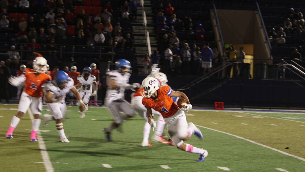 Rome Odunze of Bishop Gorman carries the ball. Bishop Gorman defeats Sierra Vista 62-7, in h ...