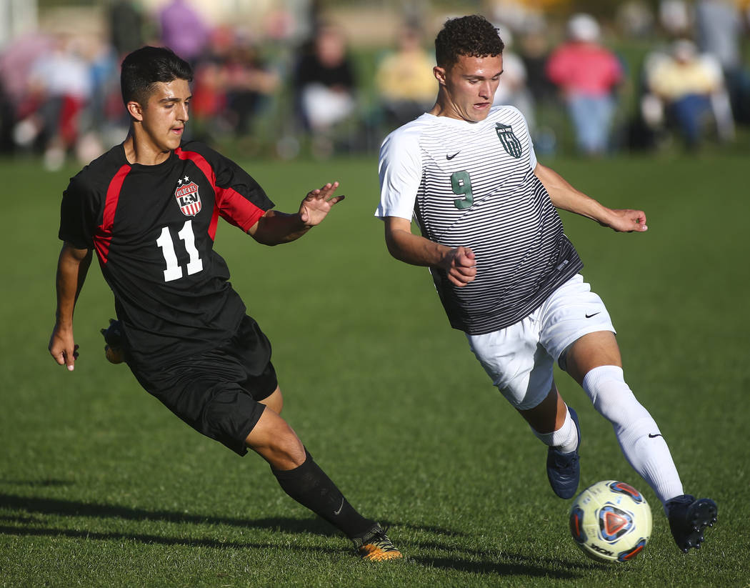 Palo Verde’s Michael Vogel moves the ball past Las Vegas’ Rigo Carrasco (11) dur ...