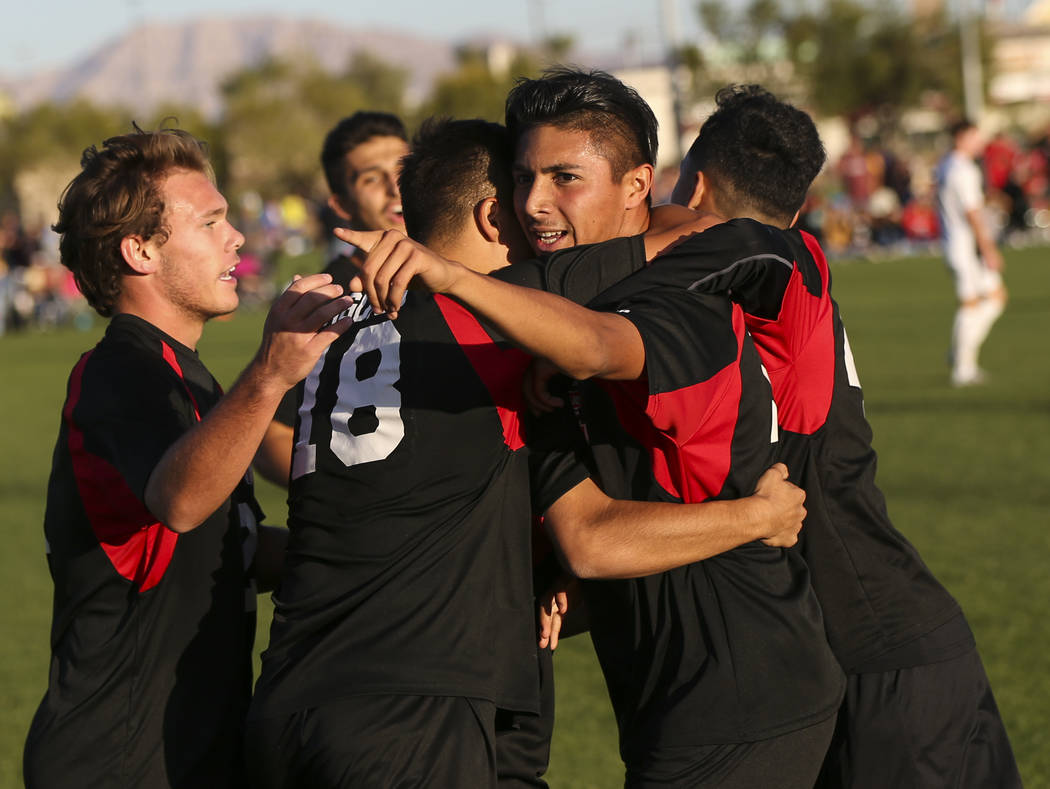 Las Vegas’ Nathan Zamora, right, celebrates his goal against Palo Verde during the Mou ...
