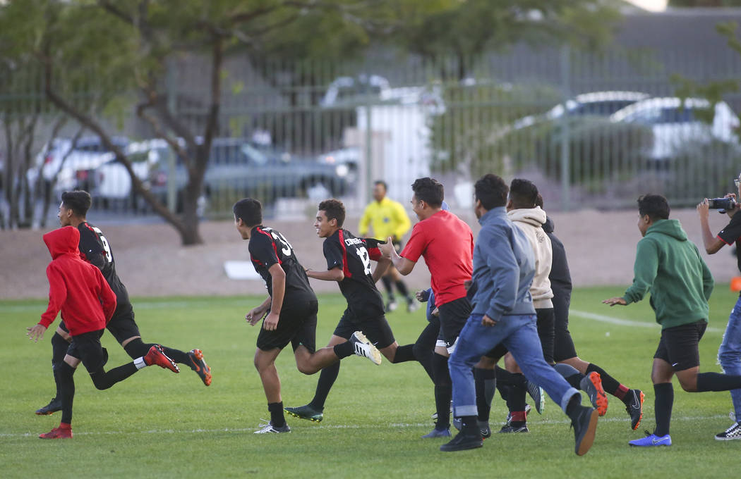 Las Vegas players celebrate their win over Palo Verde in the Mountain Region boys soccer sem ...