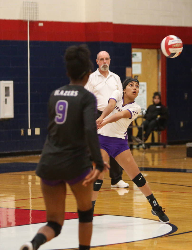 Durango’s Sierra Leone Sanchez returns the ball during the Desert Region girls volleyb ...