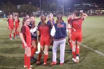 Coronado girls soccer celebrate after escaping with a 3-2 win over Desert Oasis in the Class ...