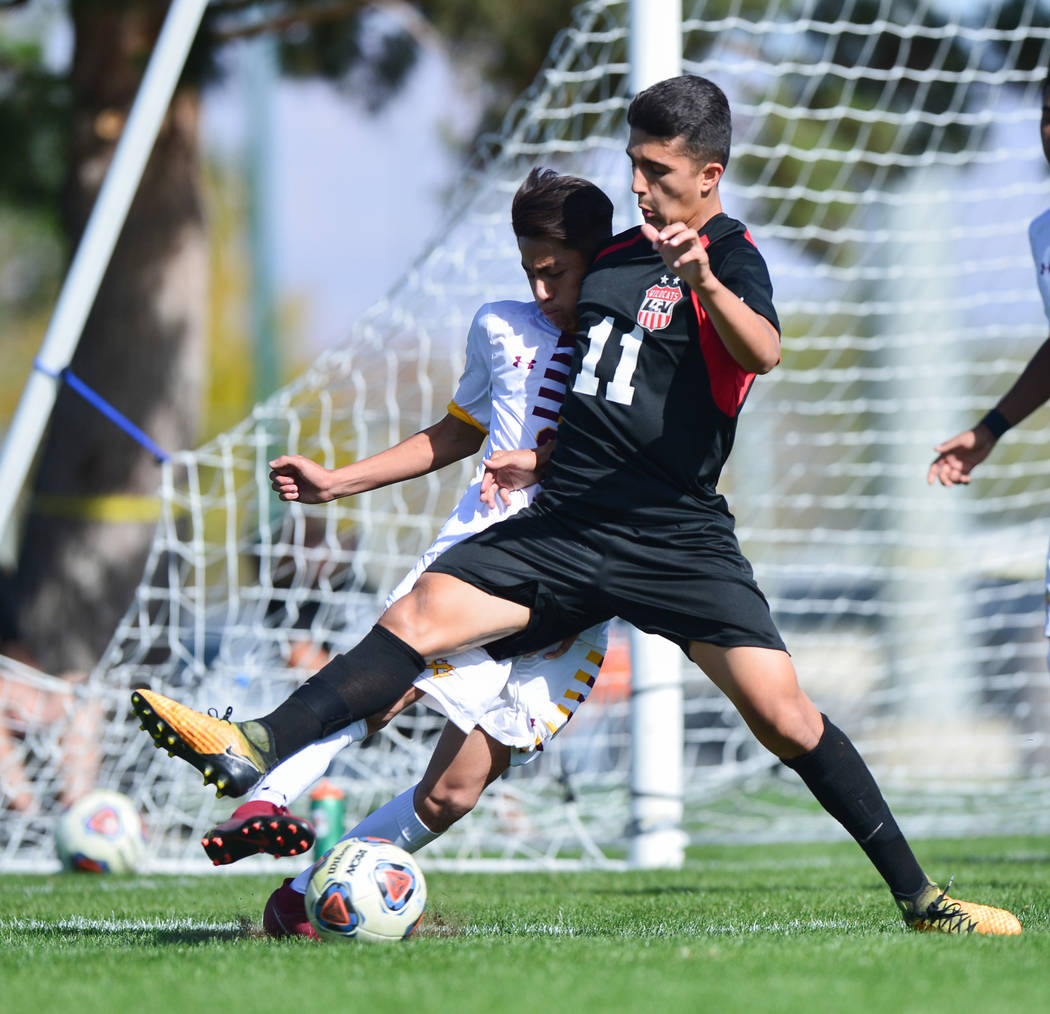 Las Vegas High School’s Rigo Carrasco (11) fouls Eldorado High School’s Jesus Es ...