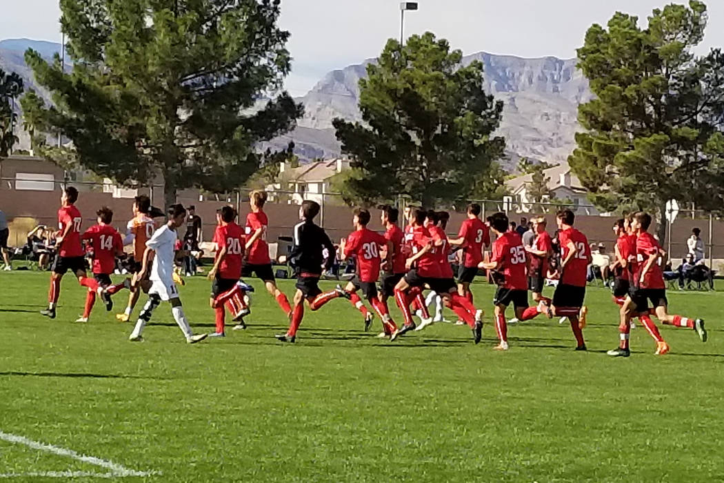 Coronado players celebrate their 3-0 victory over Durango in the Class 4A Desert Region cham ...