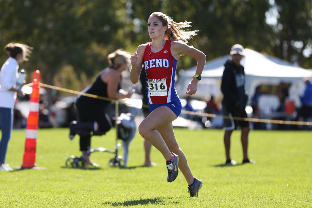 Reno’s Penelope Smerdon (316) makes her way to the finish line for second place during ...