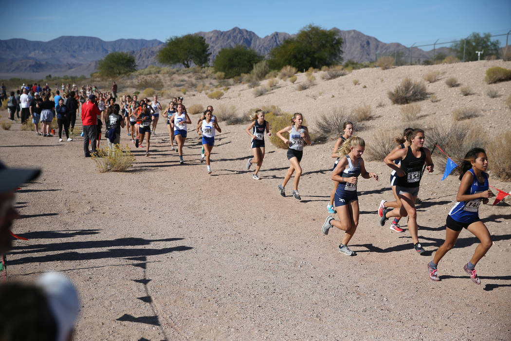 Runners compete during the NIAA 4A Girls Cross Country State Championship at the Veteran&#82 ...