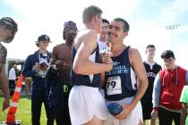 Centennial’s Tucker Raymond (81), left, and Alexander Miller (79), embrace after scori ...