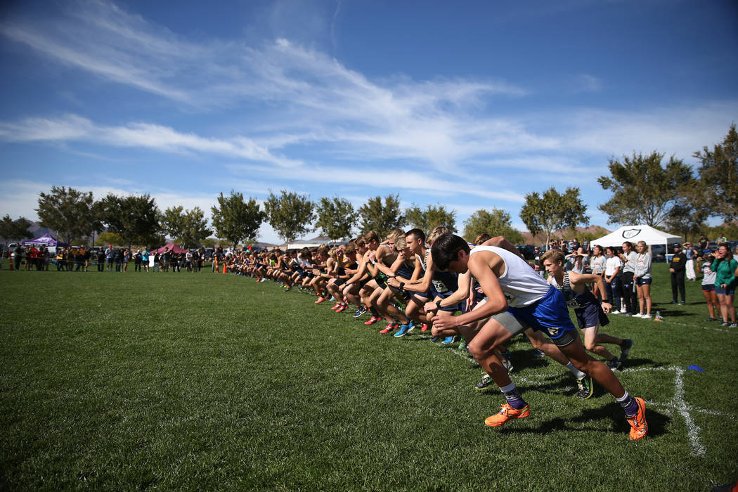 Runners start during the NIAA 4A Boys Cross Country State Championship at the Veteran’ ...