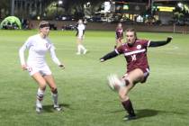 Pahrump Valley’s Halie Souza, right, controls the ball as Truckee’s Ava Seelenfr ...