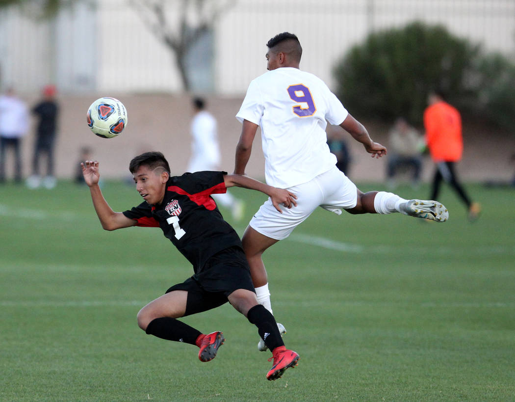 Las Vegas’ Luis Hernandez (7) and Durango’s Jose Alcocer (9) battle for the ball ...