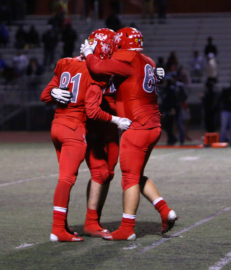 Arbor View’s York St. Hillaire (81), Arbor View’s Matt Smith (75) and Arbor View ...