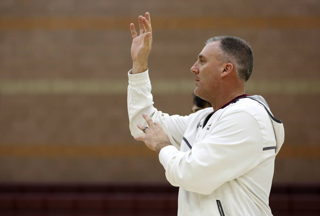 Coach Bret Walter trains the Faith Lutheran Basketball Team, which won the Northwest League ...