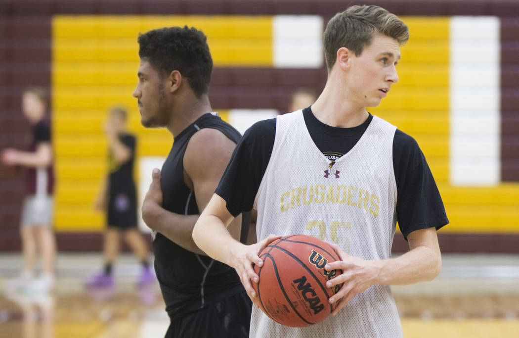 Faith Lutheran senior guard Brevin Walter, right, runs through a drill during practice on Mo ...