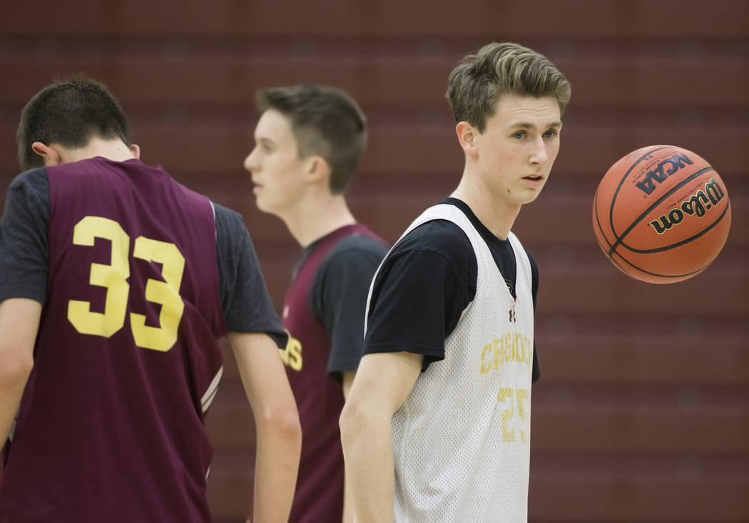 Faith Lutheran senior guard Brevin Walter, right, runs through a drill during practice on Mo ...