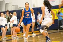 Bishop Gorman’s Georgia Ohiaeri (3) dribbles the ball as Spring Valley’s Chelsea ...