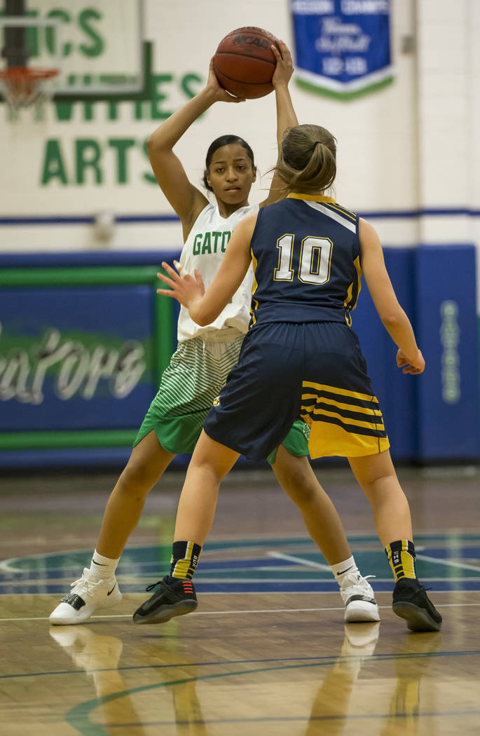 Green Valley’s Nyla Rodriguez (4) looks to pass against Boulder City’s Madison M ...