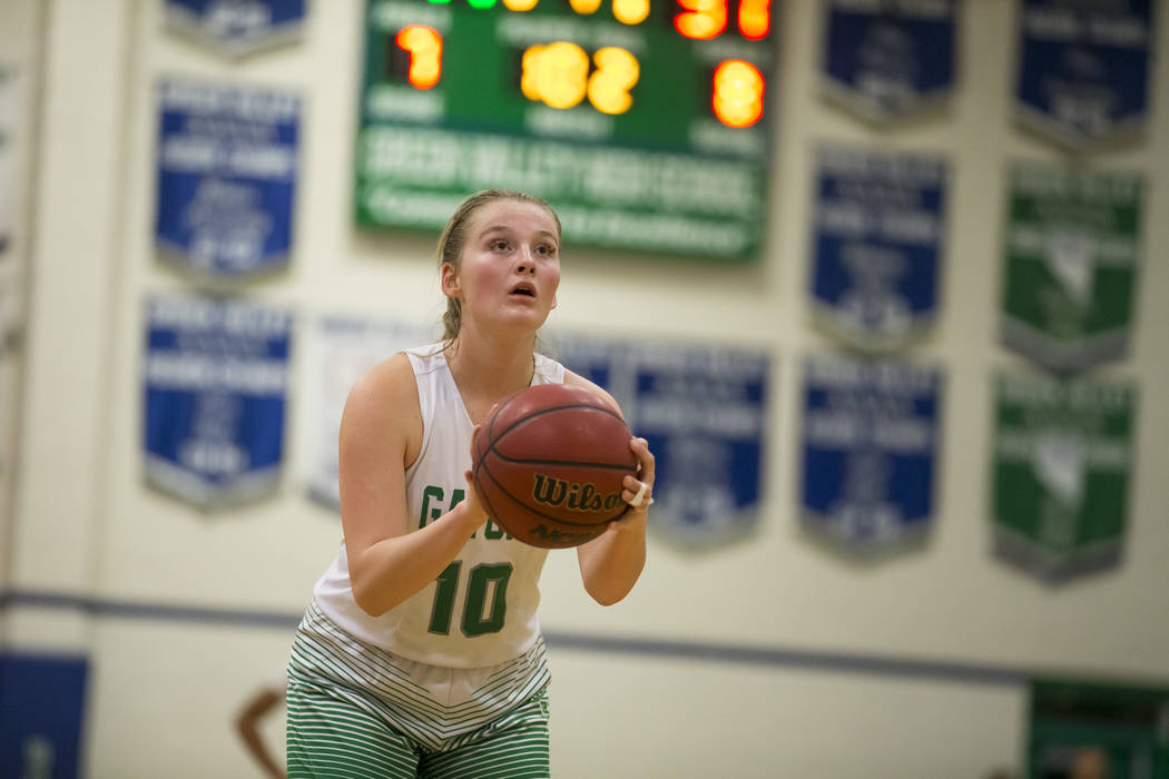 Green Valley’s Julia Clark (10) shoot a free throw against Boulder City during the sec ...