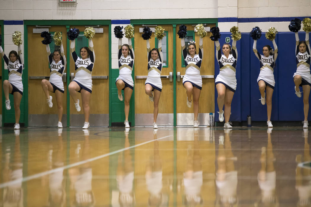 Green Valley cheerleaders hype the crowd during the second half of a varsity basketball game ...