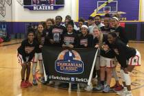The Liberty girls basketball team poses for a photo after winning the Tarkanian Classic&#821 ...
