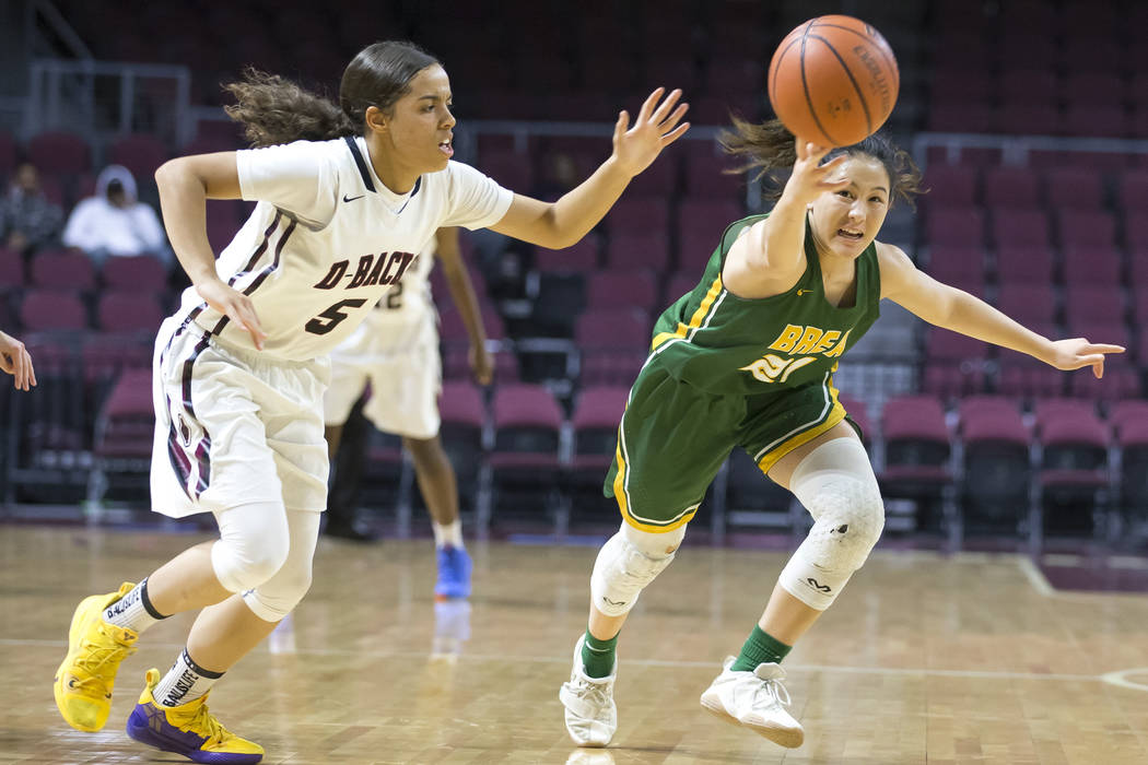 Desert Oasis’ Eliyjah Pricebrooks (5) and Brea Olinda’s Rilee Price (21) scrambl ...