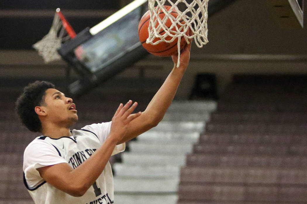 Trinity’s Daishen Nix (1) jumps up to take a shot during the second half of a basketba ...