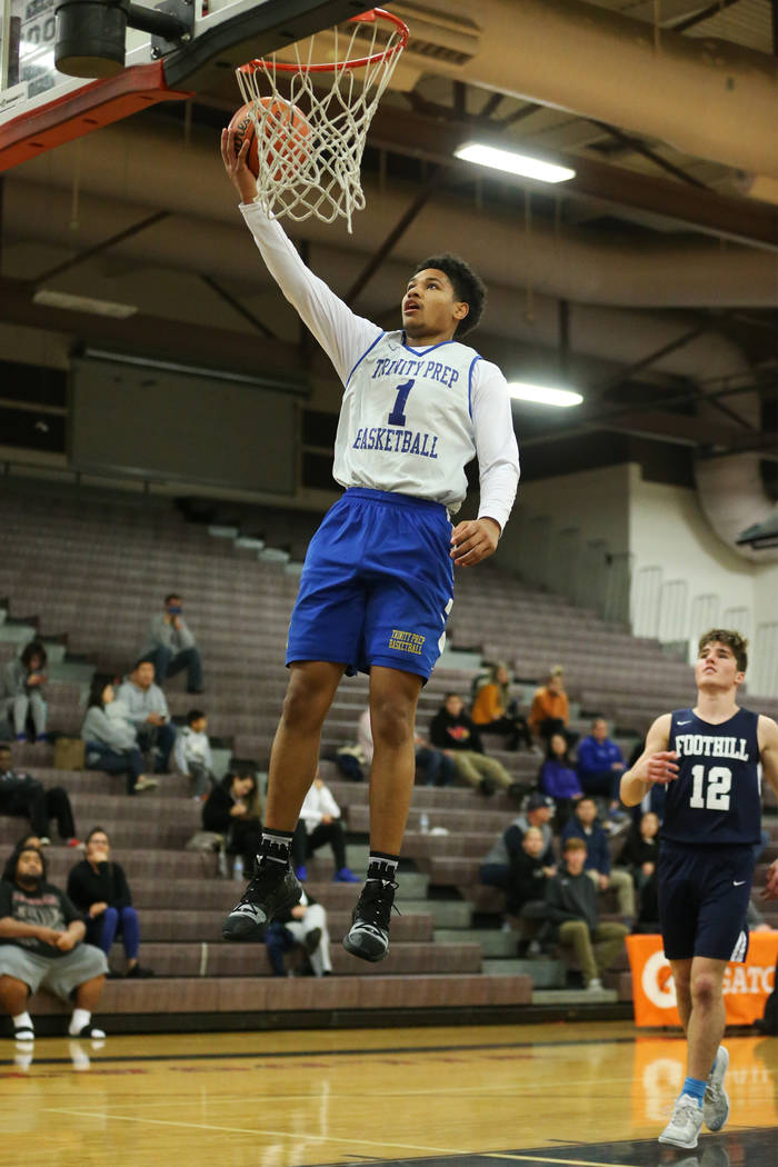 Trinity’s Daishen Nix (1) jumps for a layup and a score against Foothill in the Las Ve ...